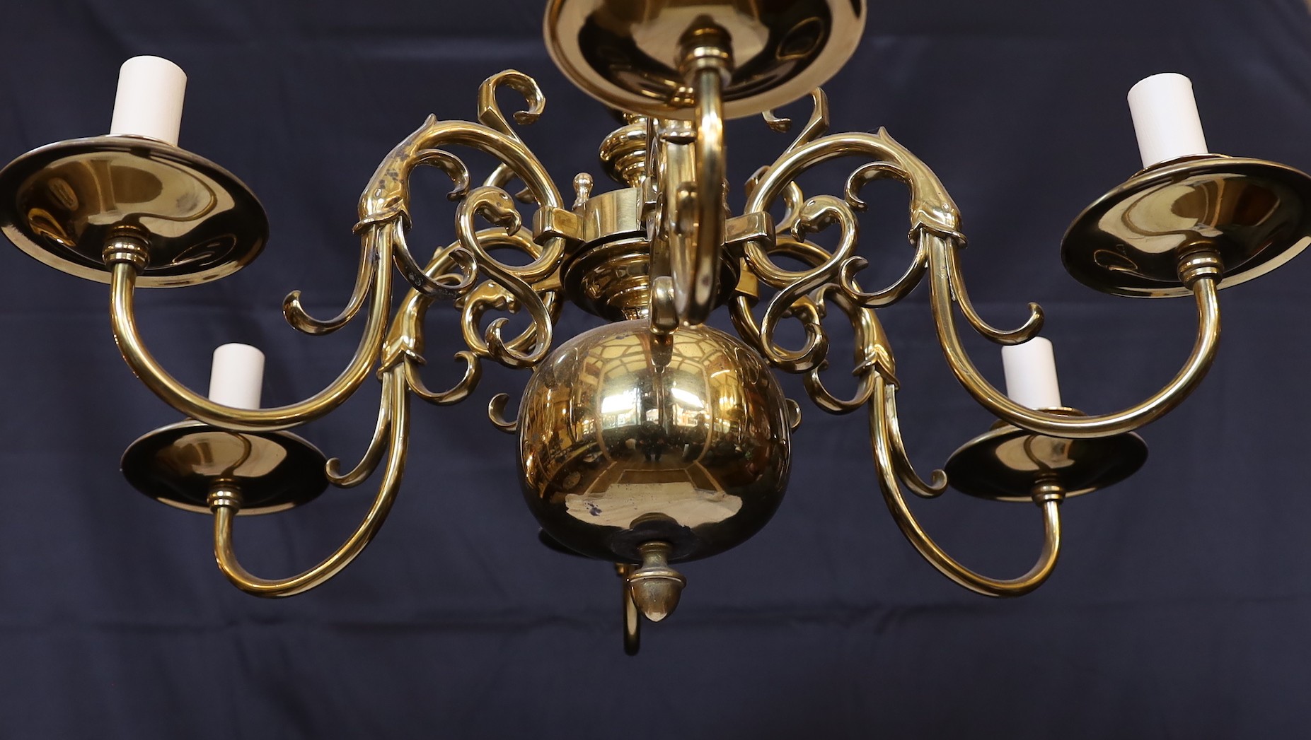 A pair of Dutch 17th century style lacquered bronze six light chandeliers, height 50cm. width 60cm